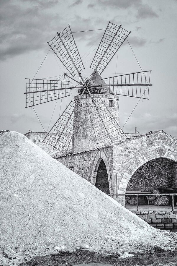 A Pile of Salt and A Windmill Sicily! buff.ly/3UgT02M #sicily #italy #windmill #salt #blackandwhite #blackandwhitephotography #marsala #trapani #historic #traditional #artforsale #wallartforsale #AYearForArt #BuyIntoArt #giftideas @joancarroll