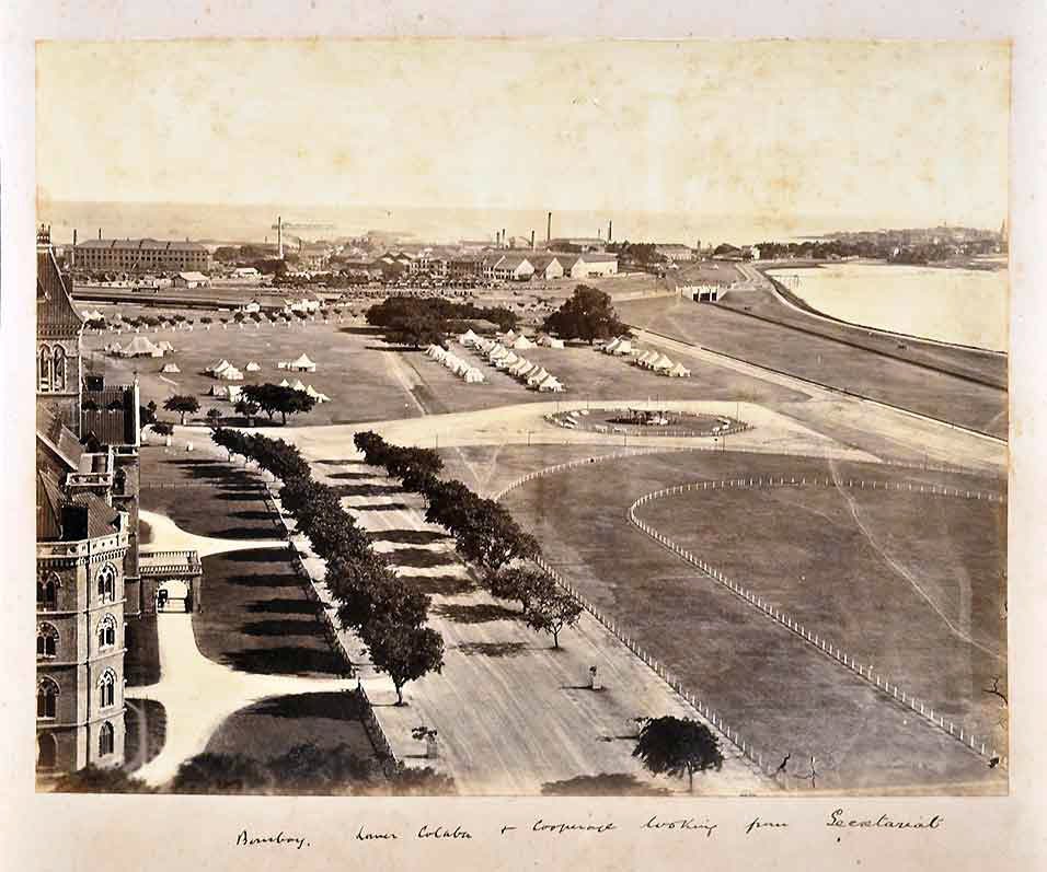 An old 1890 aerial view photo of Colaba, Oval Maidan, and Back Bay in Mumbai, probably taken by Raja Deen Dayal. 
The view is from the Secretariat building of which a portion can be seen here. The Secretariat building is on the same row of public buildings as the Rajabai Clock…
