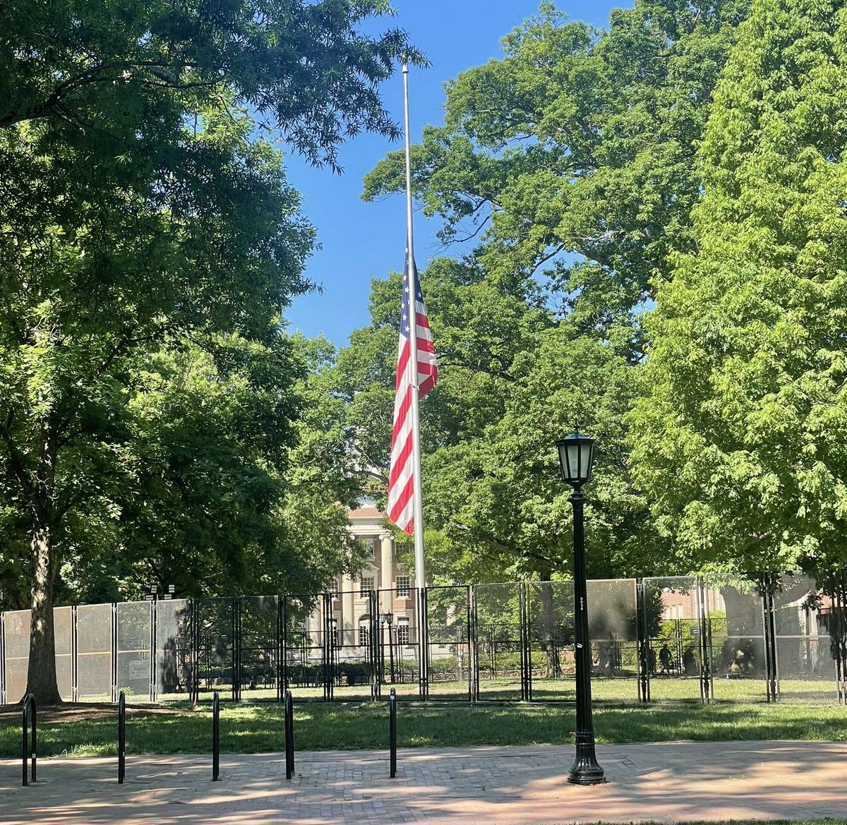 The University of North Carolina has now put BARRICADES around the AMERICAN FLAG!!! Nobody is touching old glory…