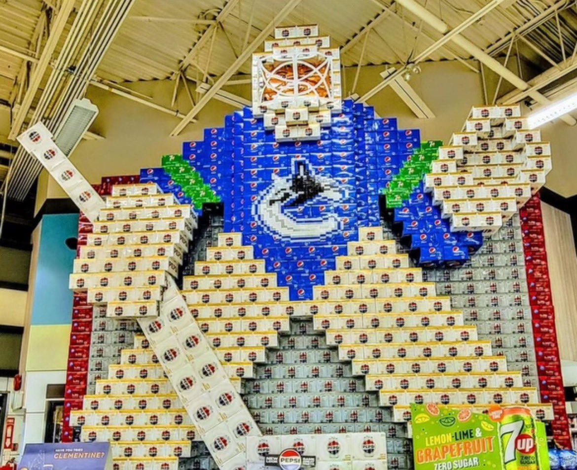 This soda can display in a Vancouver grocery store is WILD 🤯 (via @Jonfish2)