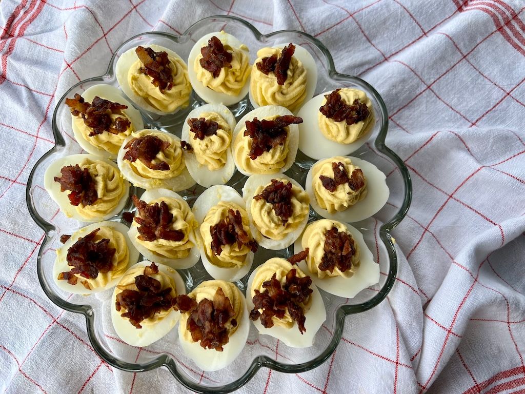 BLOG: Julia Rutland, author of our newest cookbook, Homestyle Kitchen, shares her recipe for Stuffed Eggs with Bacon-Onion Jam. I love the recipe, and you will too. #recipe #cooking #stuffedeggs #bewellbeoutdoors advkeen.co/3INu0Lv @juliarutland