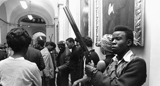 The left opposes gun bans because community defence against the state is a human right. In 1967 on #ThisDayInHistory, the #BlackPantherParty protested the #MulfordBill, which ended their ability to stop #PoliceBrutality. We're still dealing with it because liberals backed police.