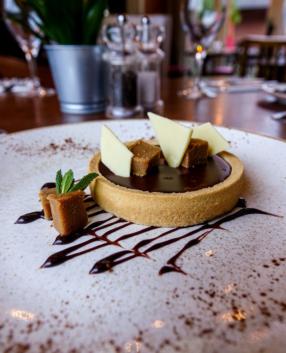 One for the chocolate lovers 🍫 dark chocolate and salted caramel tart, fudge, chocolate sauce 

@doganddoublet

#TheLewisPartnership #Stafford