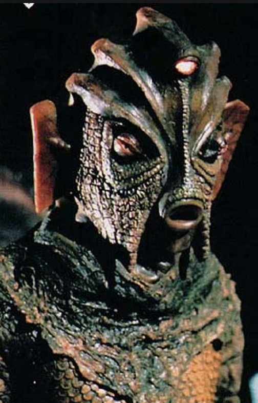 SNP = Silurians Not sure they like us but you kinda get where they're coming from.