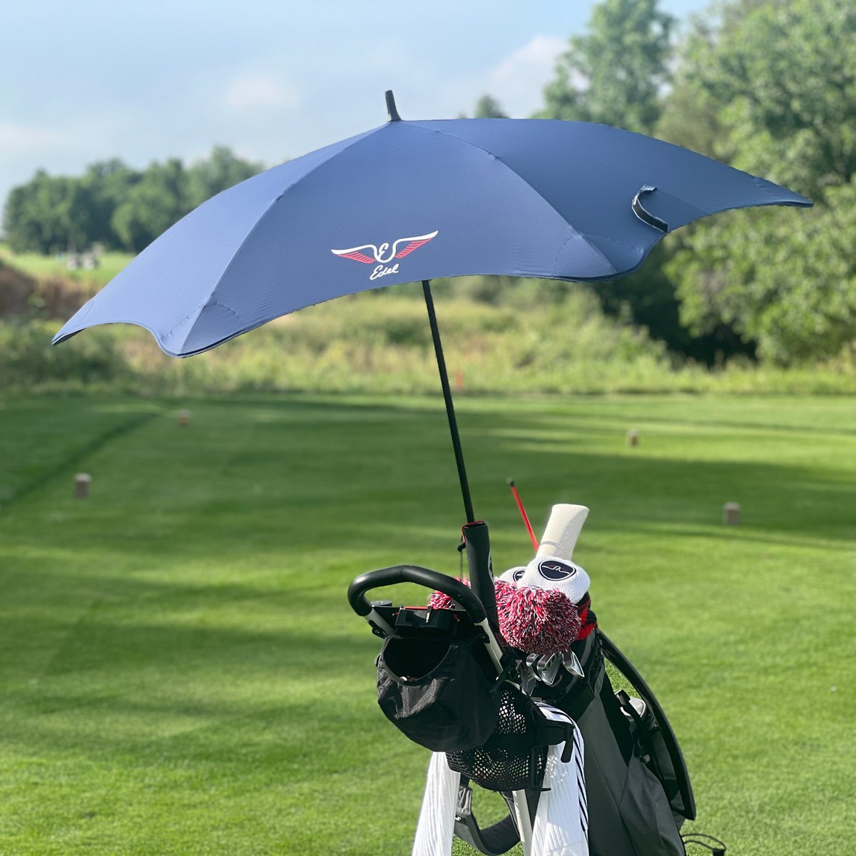 Rain ☔️ or shine ☀️, stay dry and cool on the course this season with our premium umbrella from BLUNT Umbrellas! Don't let the weather dictate your play. Buy now ➡️ loom.ly/MHLd0fw #teamedel #edelgolf #oneshot #umbrella #spring #raingear #golfgear #golf