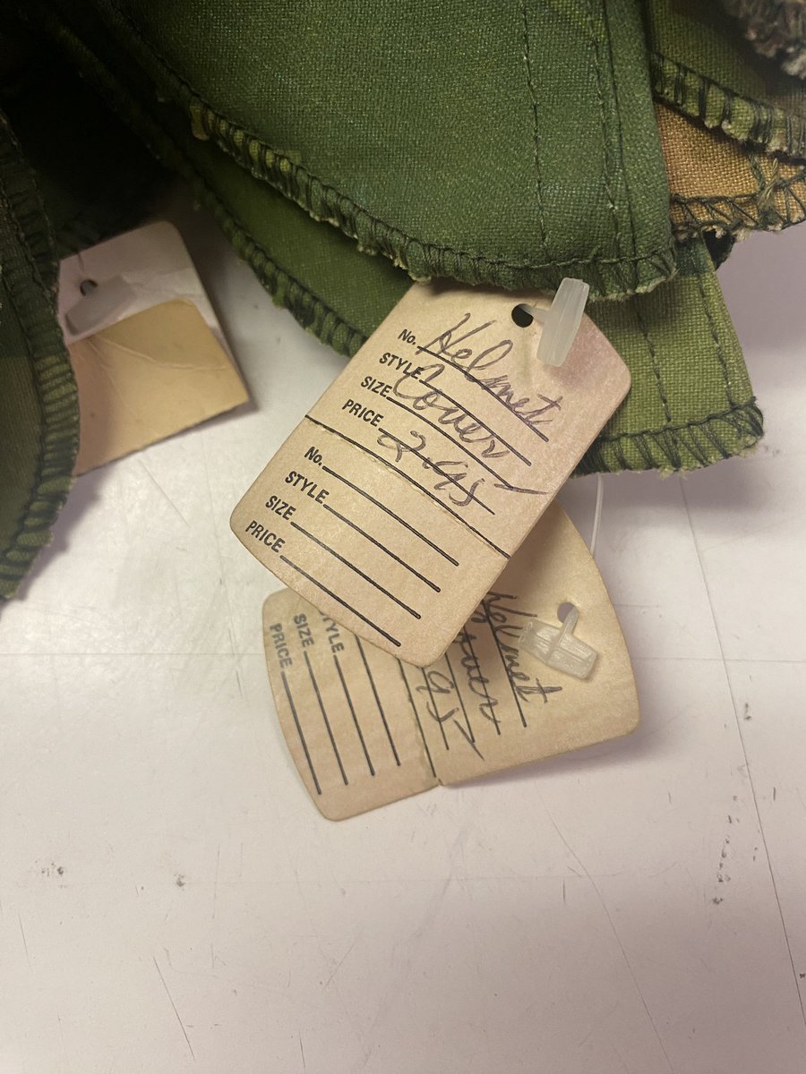 I picked up a bunch of Vietnam era mitchell reversible helmet covers a while back, and i just realized they still have the original store tags from the 80s, I wish stuff like this was $2.95 still 😂😭