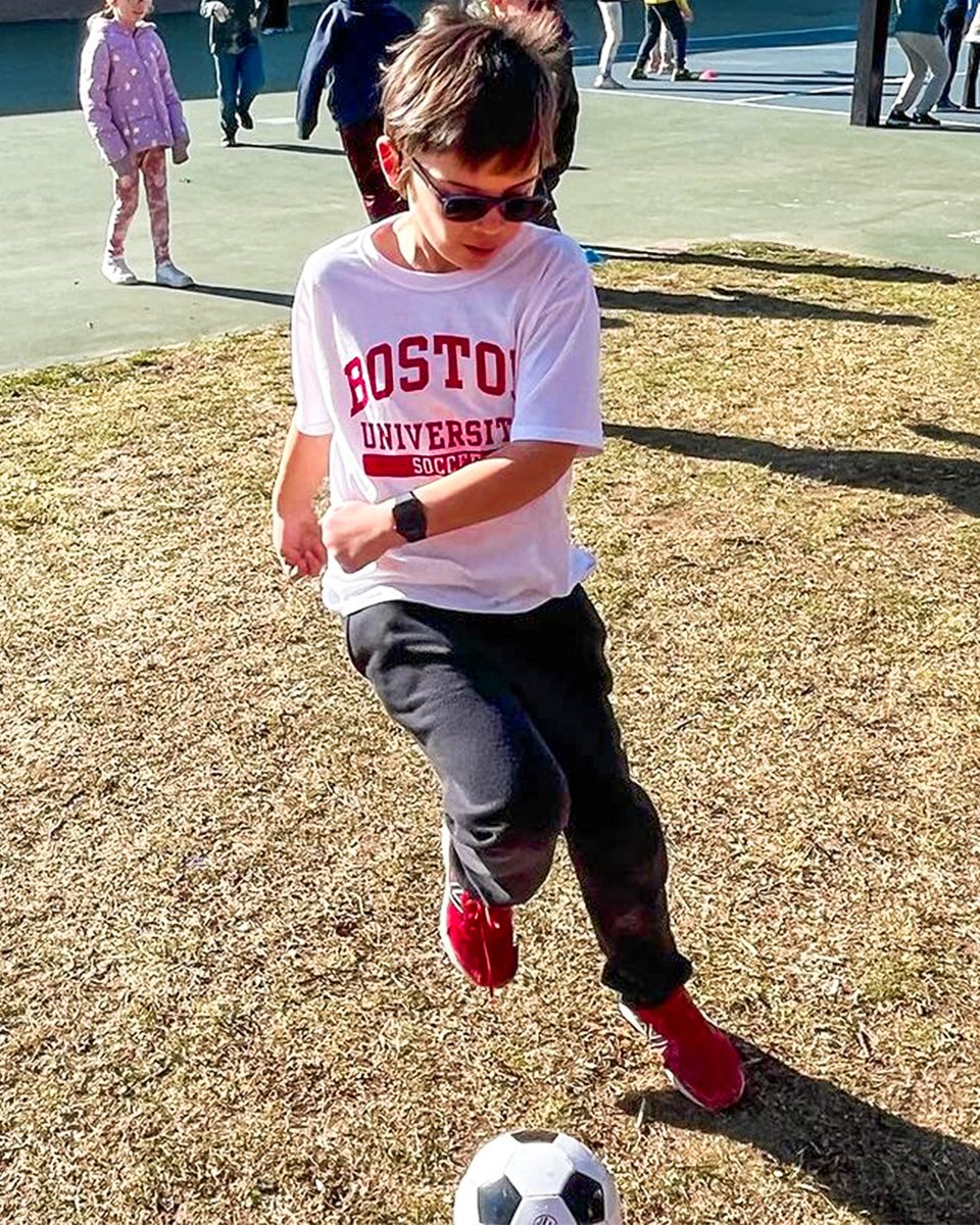Pierce's team brings the game to him! ⚽️ The @TerrierMSOC team recently visited Pierce's school to hold a soccer practice with Pierce and his classmates, bringing Team IMPACT beyond the field! #AllInAllTogether