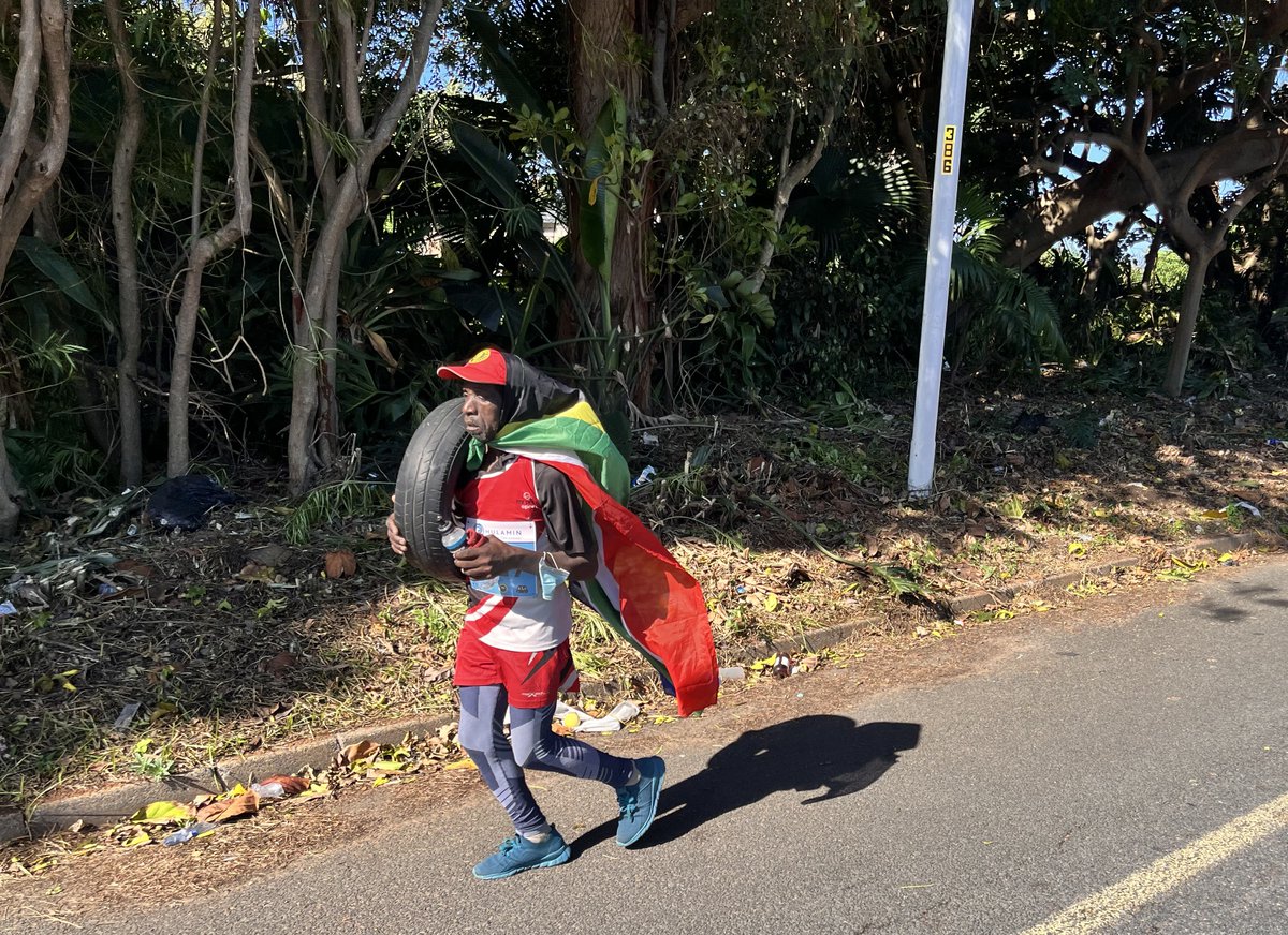 Show me that you’re tired without telling me that you’re tired.

You see some strange sights on a marathon and this is one of them. I asked him what the deal was and the answer was a bit incoherent but I think he said, “I love my tyre.” No judgement from me. 
#RunSouthAfrica