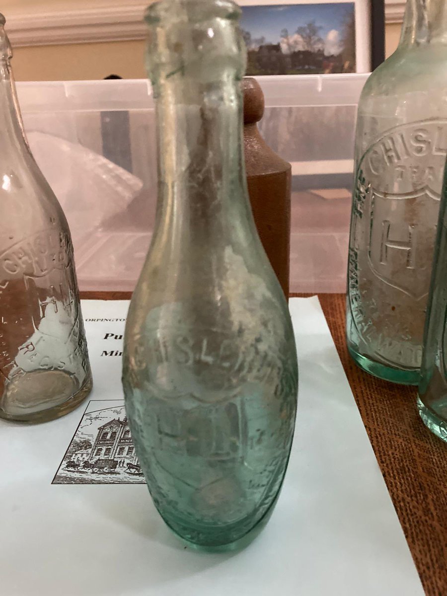 We have 5 clear glass Chislehurst Mineral Waters bottles, 1 dark glass bottle and 2 terracotta bottles available for a donation ( individually or multiple ). Call into the Old Chapel office to inspect and collect from tomorrow.