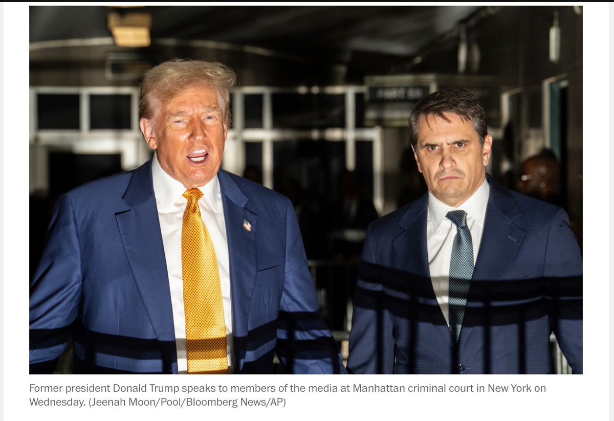 Courtroom Couture, Part 10 continued.

Prior to court, Defendant Trump placed himself in the klieg lights of the media. The uplighting cast a demonic look across his face, while the shadows across his chest evoked a prison uniform or the bars of a cage.