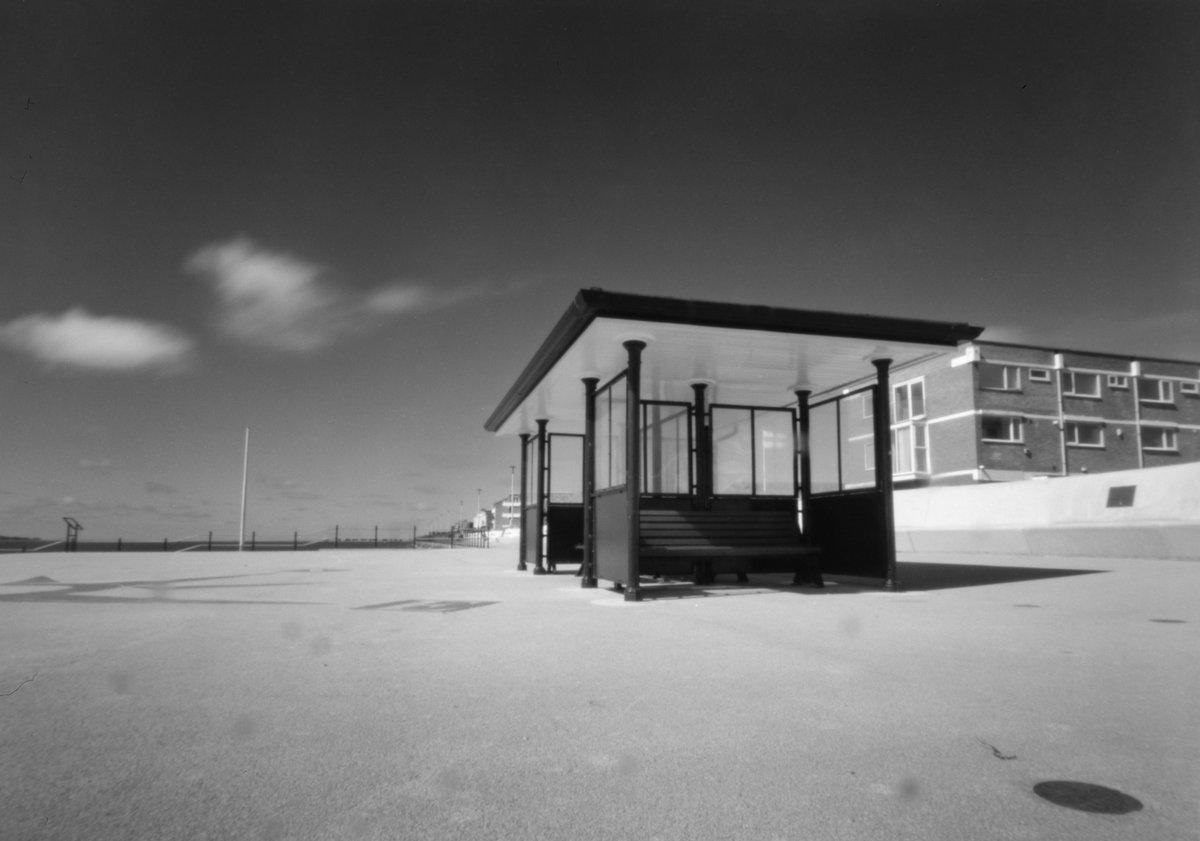 Shelter from #WPPD 📷Homemade 4x5 Pinhole Camera (72mm f240) 🎞️Shanghai GP3 (using Adox CHS 100 II reciprocity) Devd in D-23 #filmphotography #BelieveInFilm #pinholeday #pinholephotography