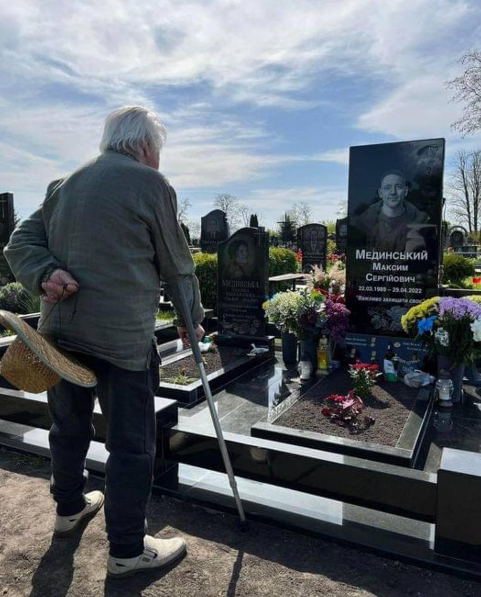 A grandpa stands by the grave of his grandson, Maksym Medynskyi, who was killed by Russia two years ago. Mr. Yurii is 87 years old. His father, Maksym, was killed in WWII in the spring of 1945. His grandson, Maksym, died in this war in the spring of 2022. Ukraine has a very…