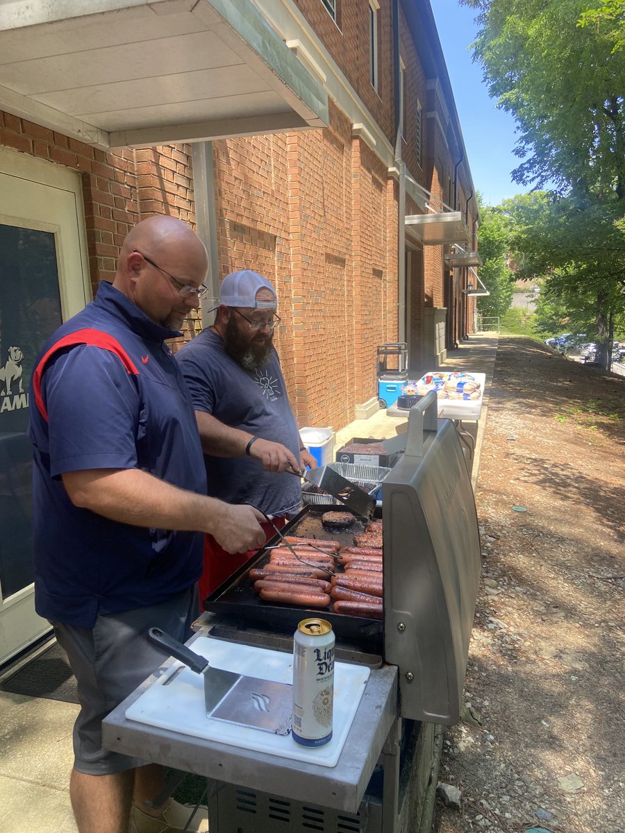 Equipment Guys always answer the call, cooking for the players while we practice. Go Dogs