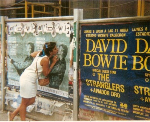 A girl kissing the posters of David Bowie in Madrid, 1987.