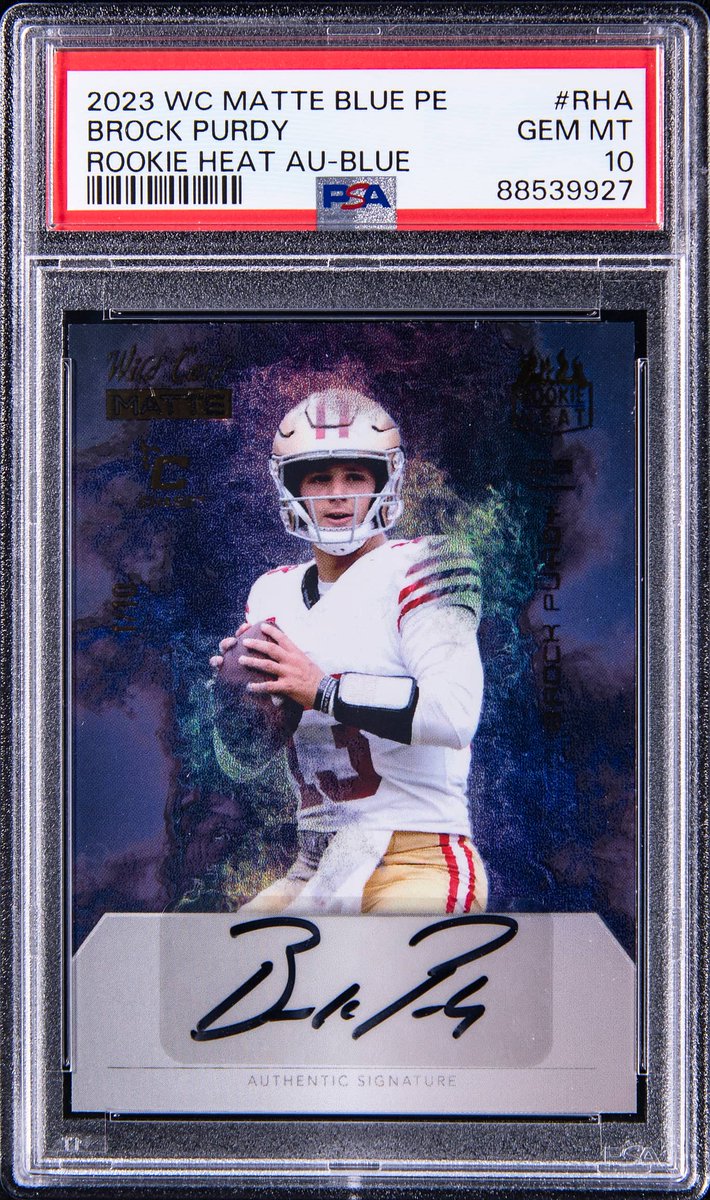Brock all night and Purdy everyday! 🏈 This 2023 Wild Card Matte Blue PE Rookie Heat Autograph Blue Brock Purdy Signed Rookie Card - PSA GEM MT 10 is available now in our Weekly Auction: bit.ly/4bcAVKc Open Extended Bidding starts at 10 PM ET ⏰