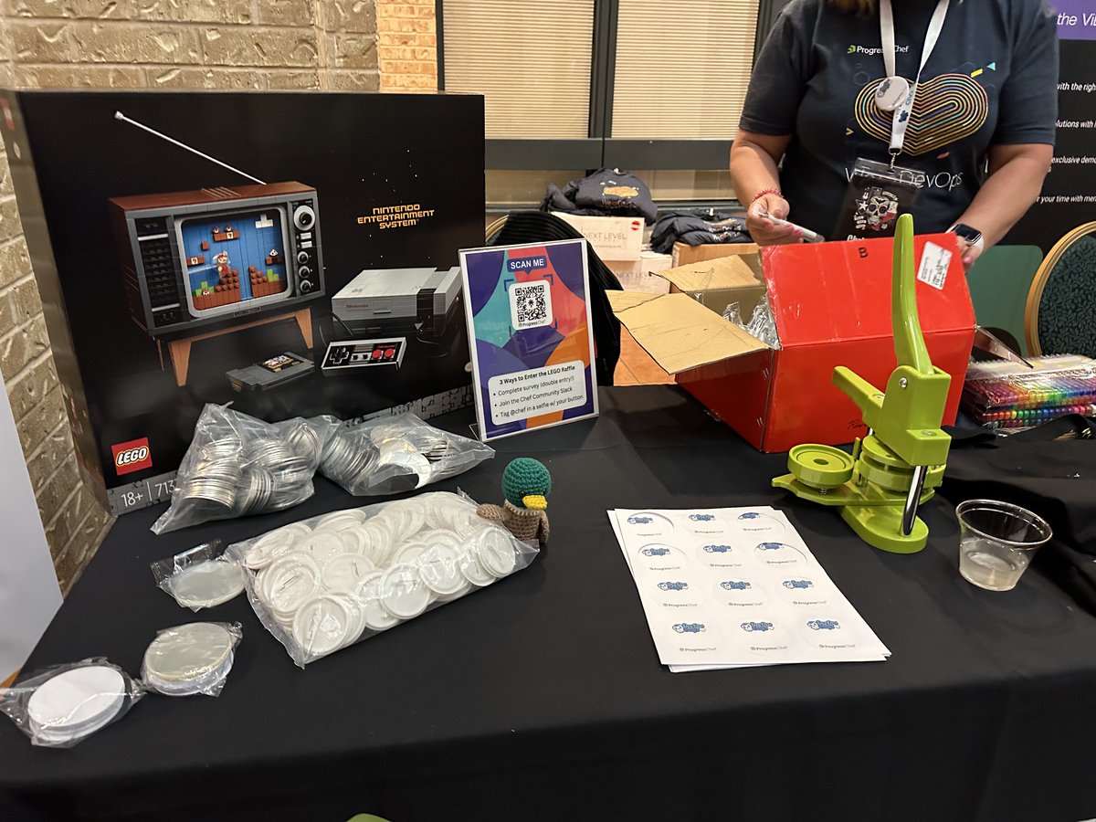 Hey @DoDAustin! Hope everyone is having a great start to your day. Come stop by, grab some @chef stuff, design your own button, and win a LEGO Nintendo. #WeHeartDevOps
