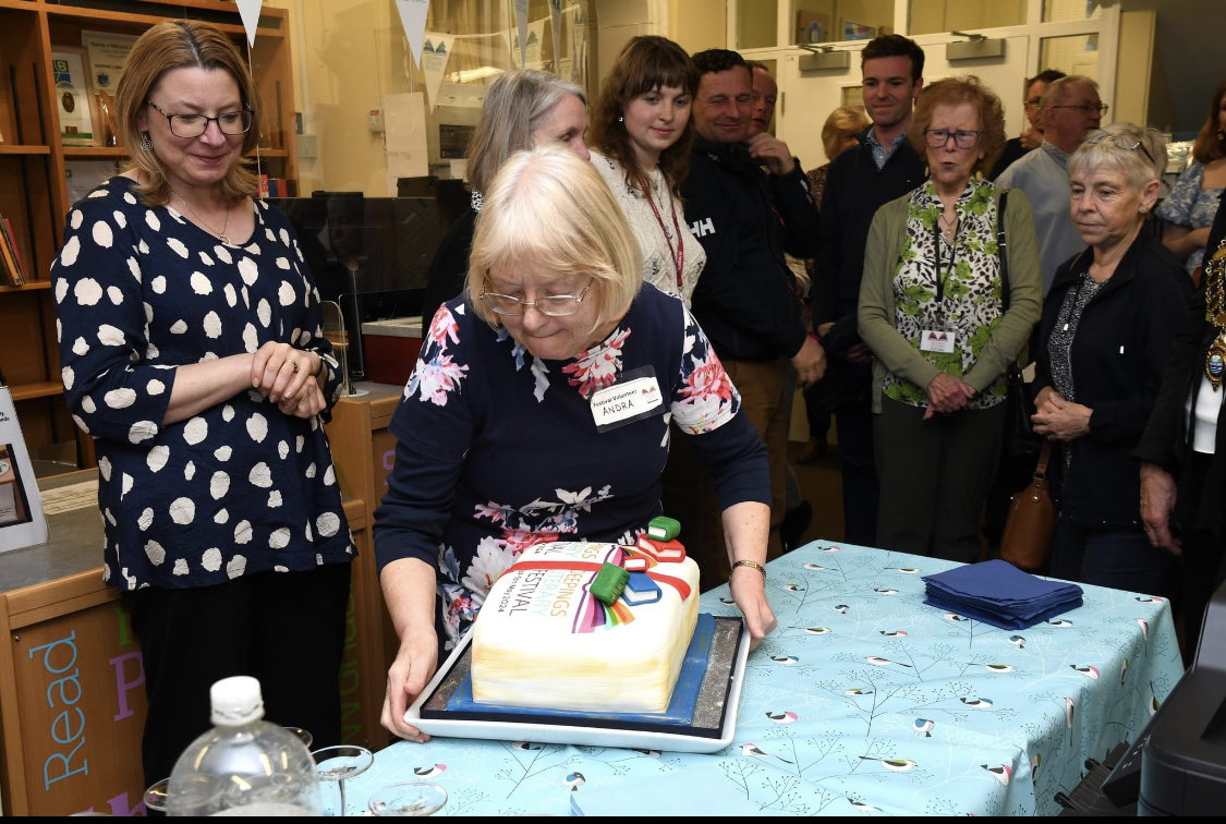 Latest job as an author was cutting the cake at the opening ceremony of the Deepings Literary Festival. The best thing about this photo is the expression on the face of the woman in green.