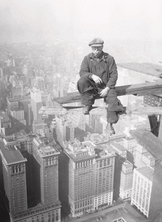 A skyscraper builder seated at 800 feet above the ground, 1929.