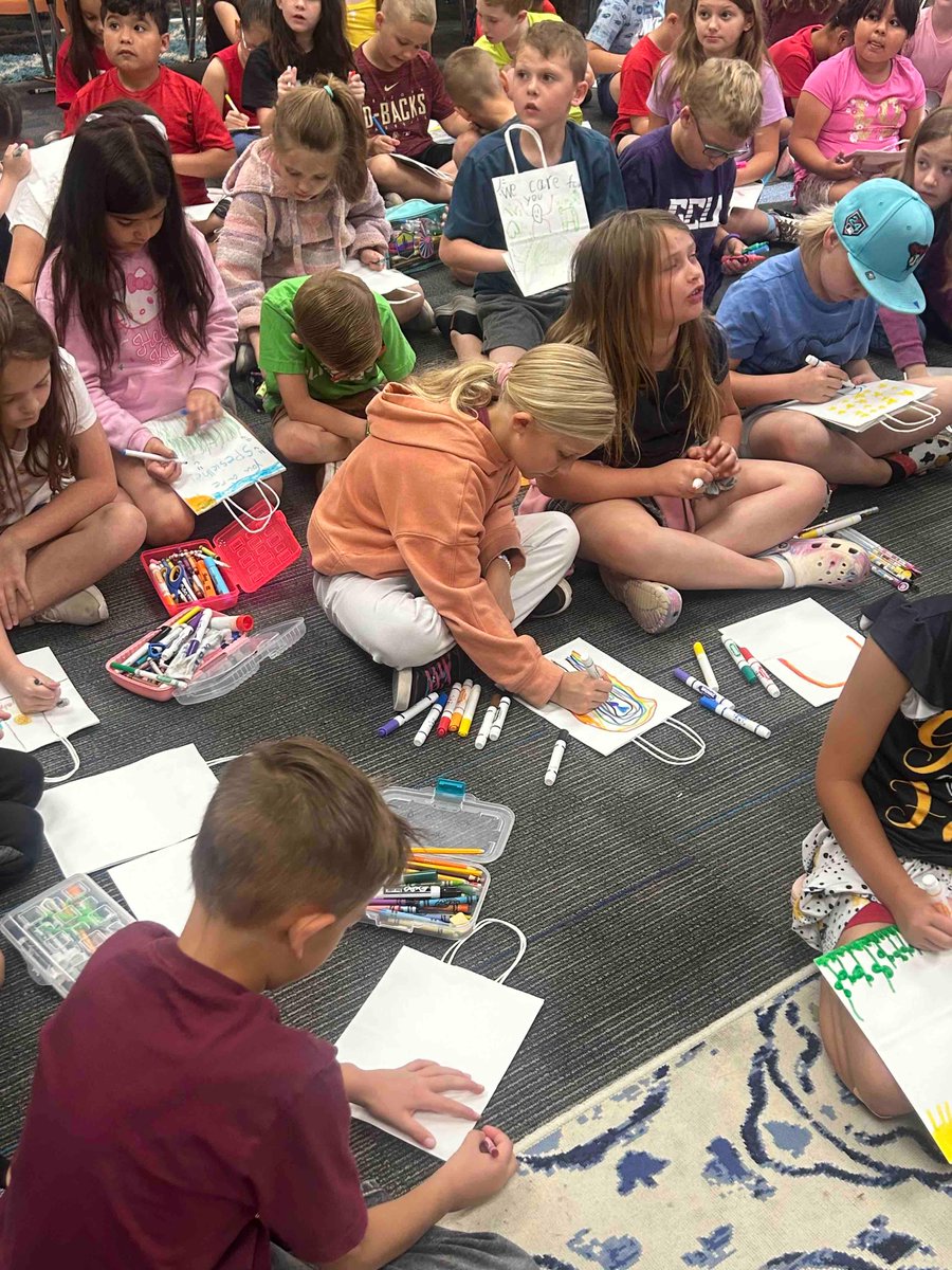 2nd grade decorating bags for QCE gives back. #qceleads #qcleads #QCEEaglesSoar