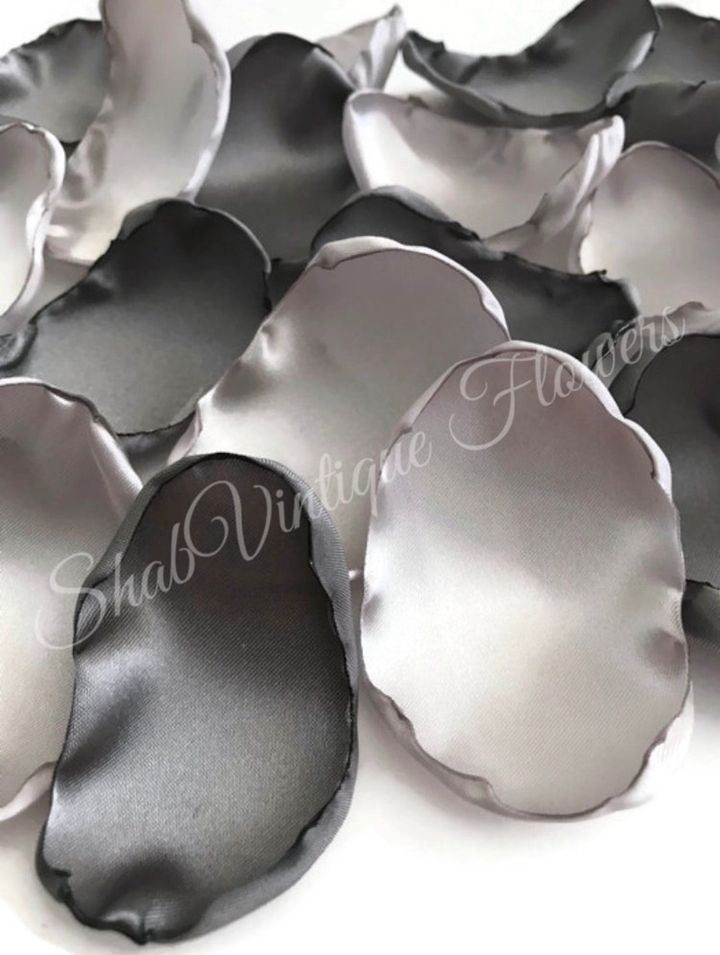 Transform your walk down the aisle with our elegant gray slate and light silver flower petals. Perfect for weddings! #WeddingDecor #ElegantWedding dlvr.it/T6Kr5c #weddings #bridalshower #weddingaisledecor #bridal #intimatewedding #weddingplanning #miniwedding #flowers