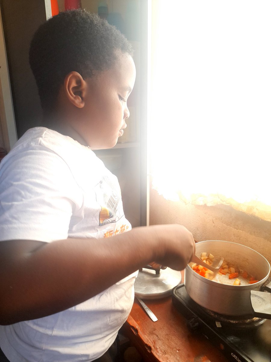 Catch them young😊😊😊my nephew cooking us a meal😁😁