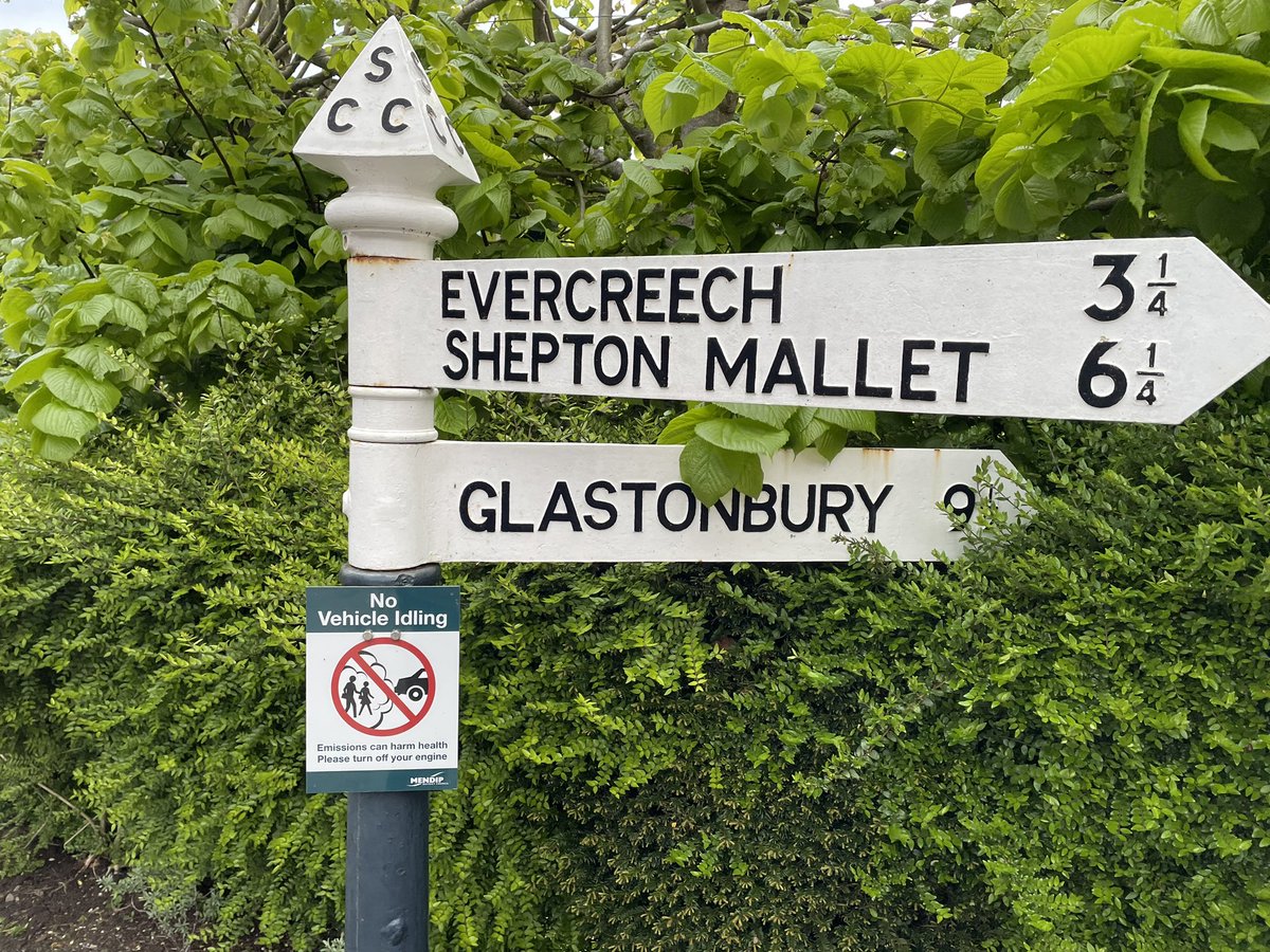 Out in rural #Somerset this evening. In beautiful #Ditcheat where they have these fabulous finger posts… with no idling signs near the school! A wonderful Lib Dem Mendip District Council legacy.