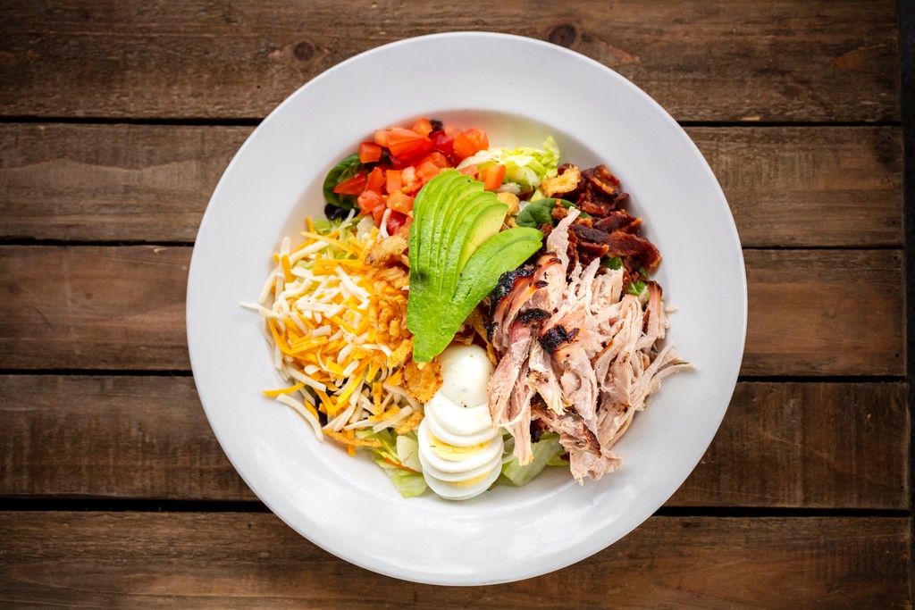 Crunch into freshness with our BBQ Cobb Salad! 🥗 #BBQSalad #FreshBites #BadtotheBoneBBQOC