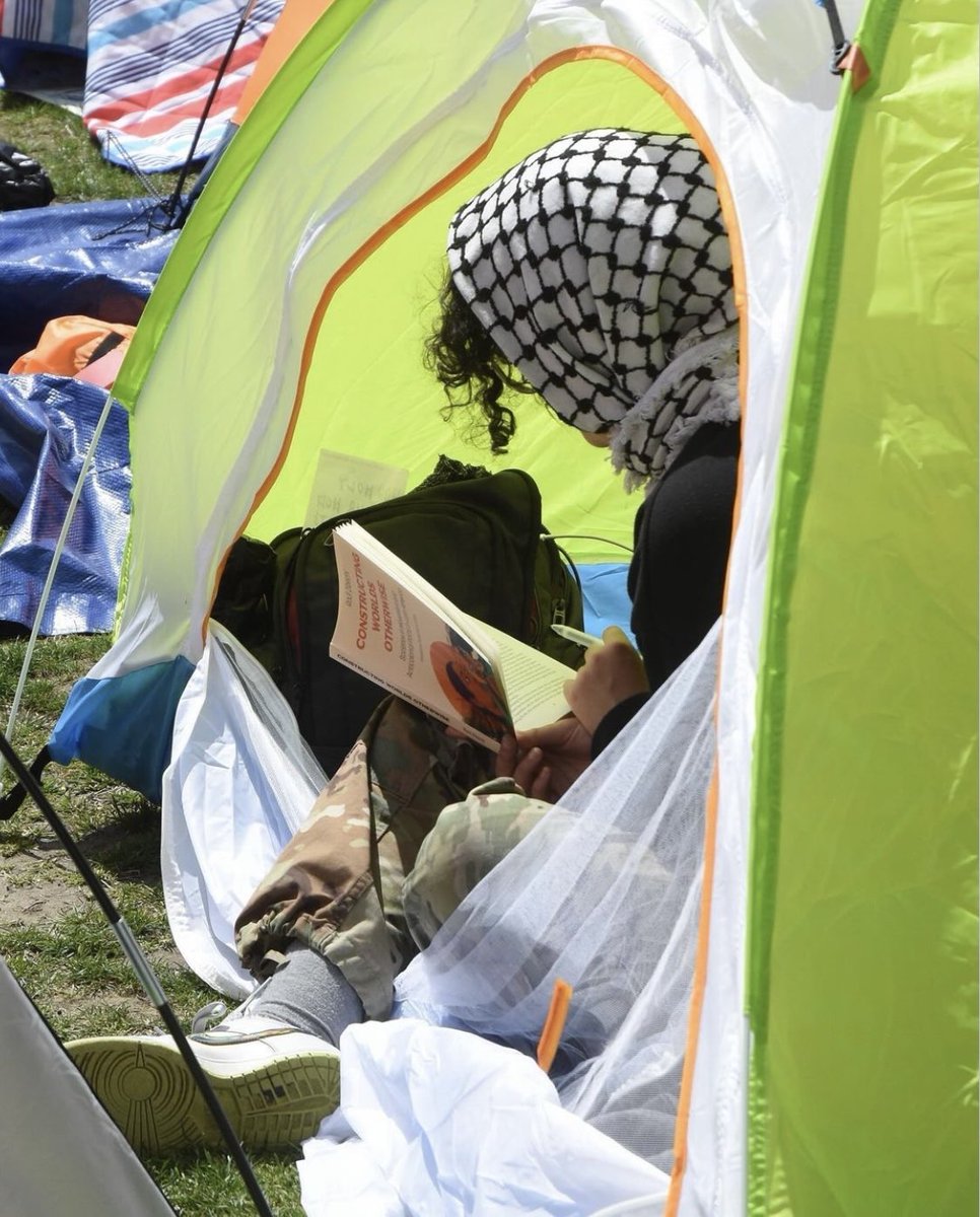 To the brave students: if you want AK Press books at your encampment, please reach out to us at books@akpress.org! Photo credit: Hannah LaFollette Ryan, who photographed a camper at the City College Gaza Solidarity Encampment in Harlem reading Constructing Worlds Otherwise.