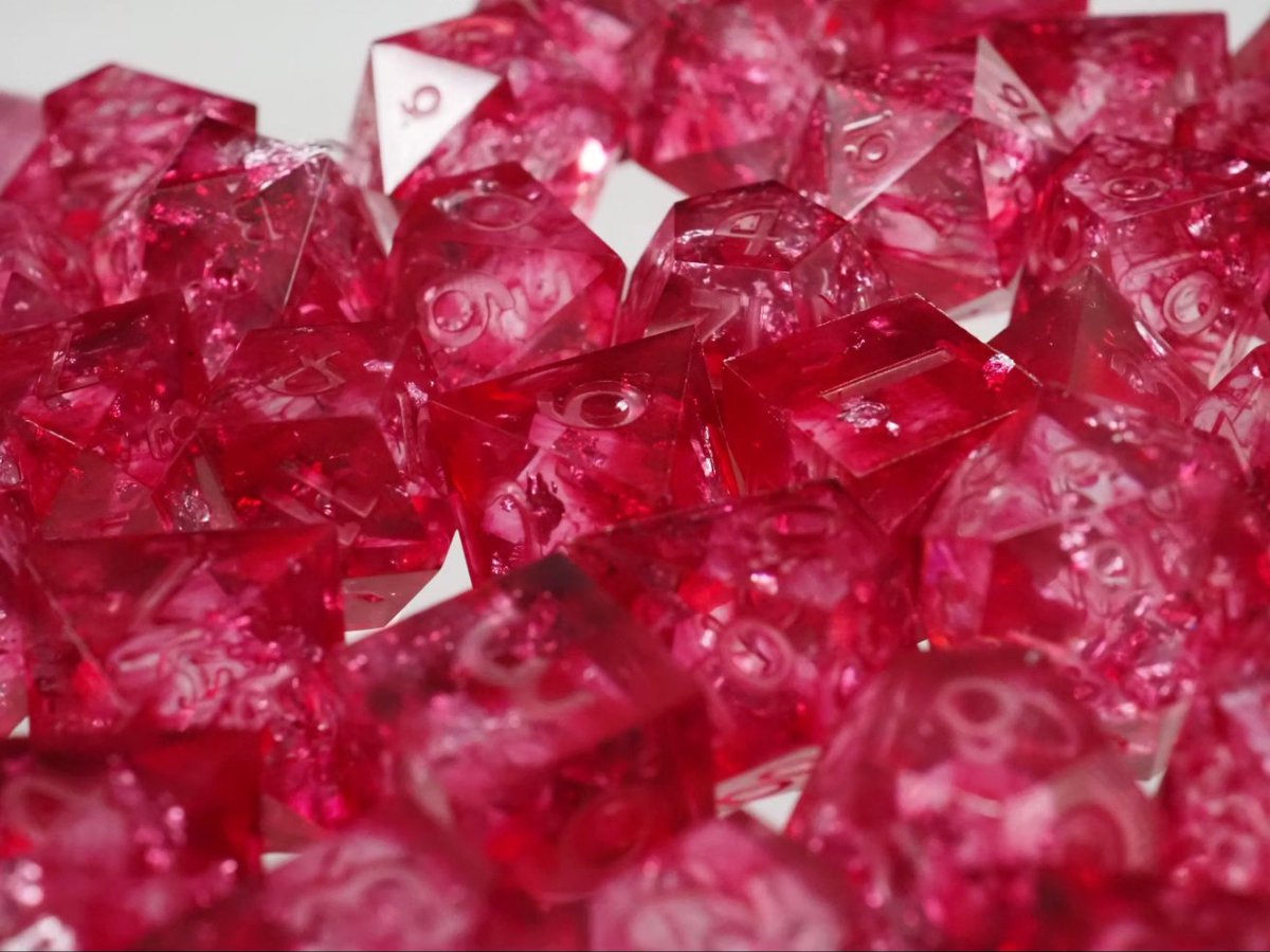 I made a new batch of 'Vampiric #Dream' #dice. They are made with a dashing red color and some #silver metal foil inside. These are still raw and need some sanding and inking. The inking color will be silver. (Ad) #dnd #dnd5e #epoxy #resin #rpg #ttrpg #pnp #pnpde #würfel #vampire