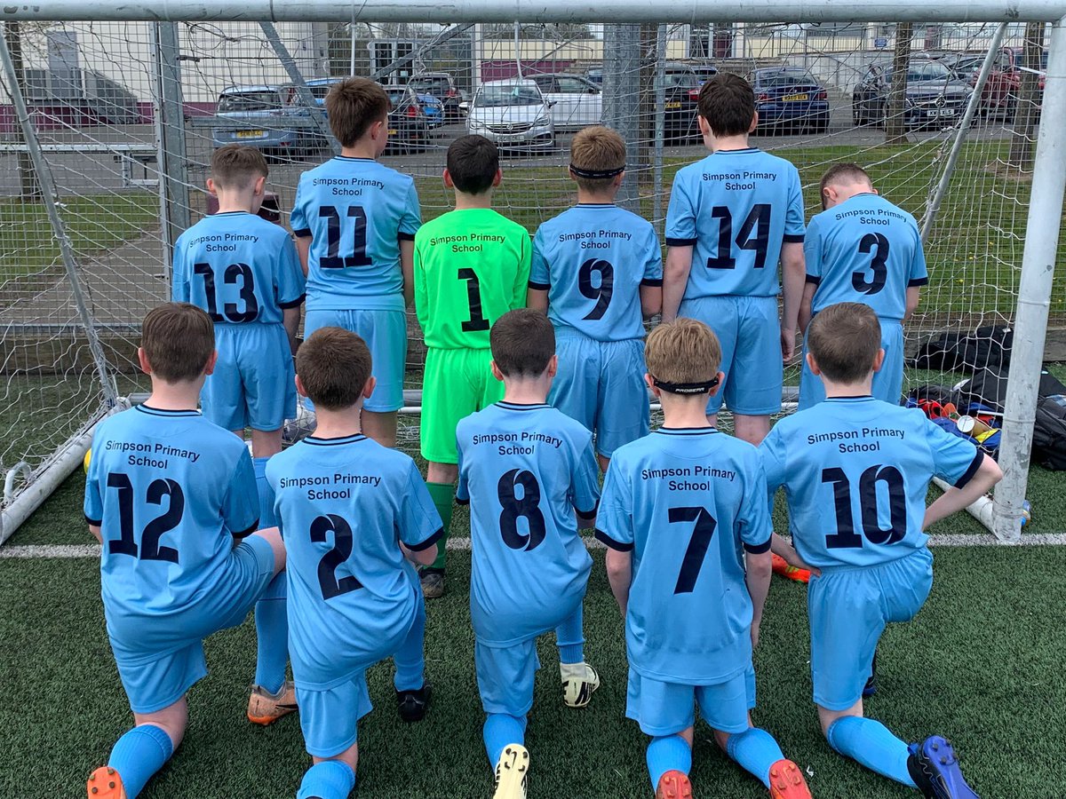 P7 boys rocking there 
     new football strips