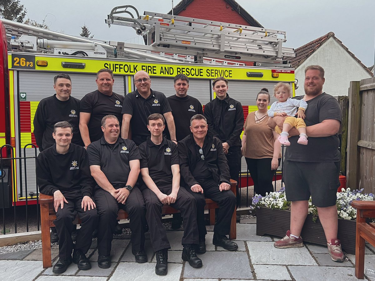 SuffolkFire's tweet photo. Tonight Long Melford firefighters were joined by the family of the late Brian Stringer to celebrate his wife Sally’s 60th birthday. Brian served as Watch Manager for many years, therefore It was a fitting tribute to gift flowers to sally and her family during a small ceremony 🚒 https://t.co/HxvivS7KDK
