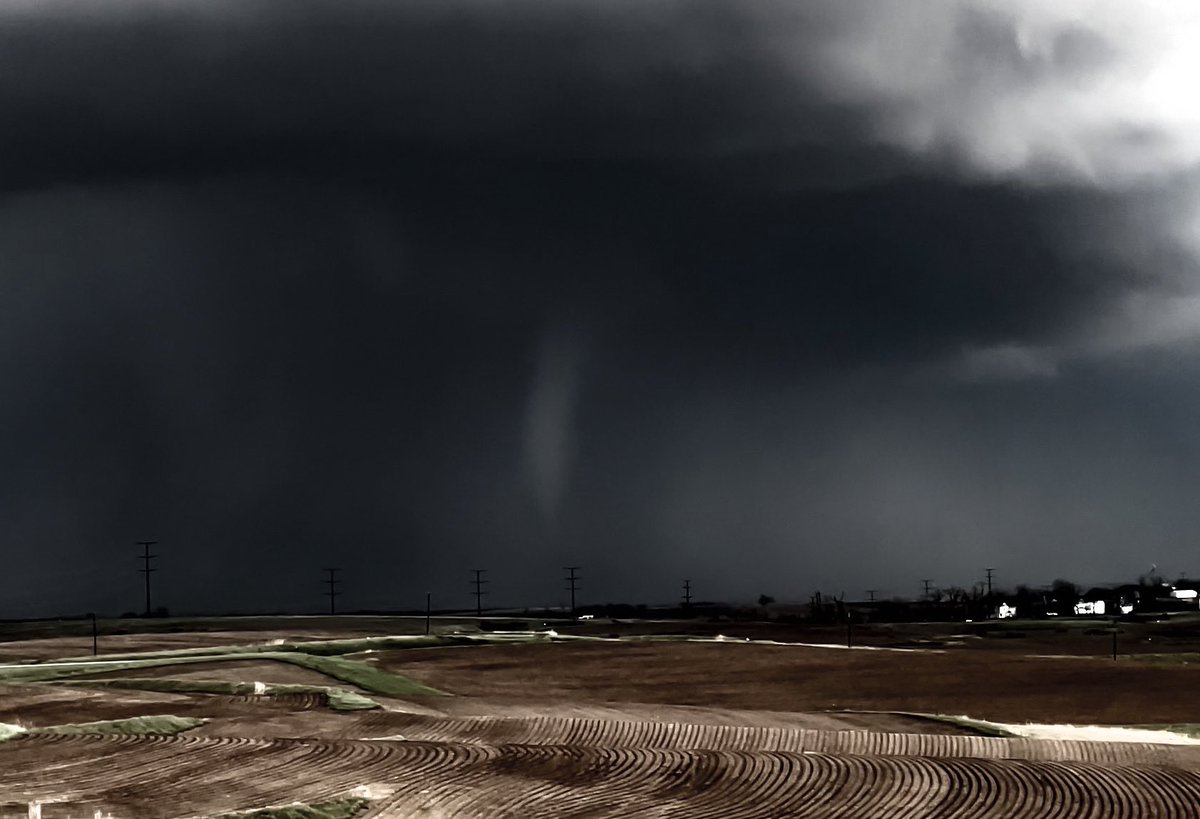 an occluded mesocyclone clears out the RFD precip to reveal the final moments of a significant, long tracked tornado in southwest Iowa on April 26th, 2024 - our path to get closer to this tornado was closed due to the damage that it caused  -