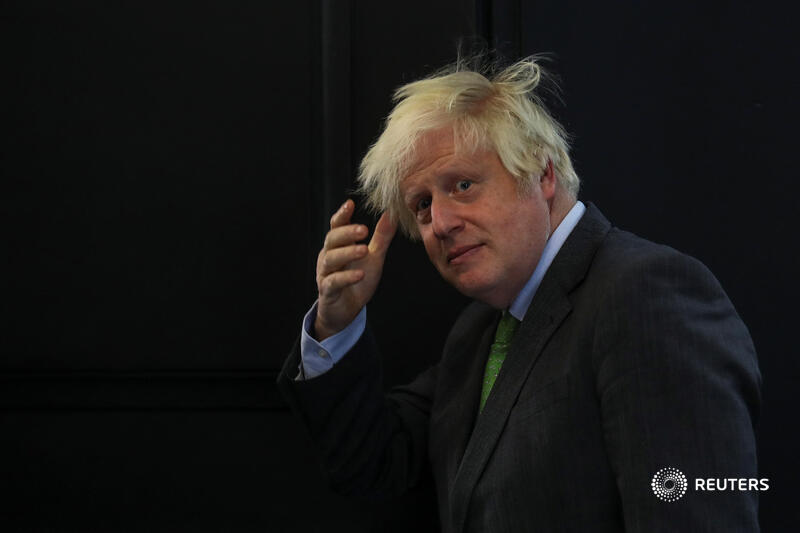 Former British prime minister Boris Johnson, who introduced a contentious requirement for voters to show photo ID while voting, was turned away from a polling station for forgetting to bring his reut.rs/3UIvdu7