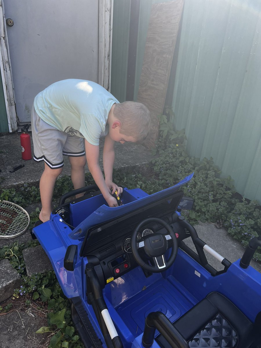 My Boy rewiring and reassembling his old power wheels for the second!  1st time complete tear down and reassemble it. It worked fine. Let’s see what happens the second time around. 🤣no help from me! He is my little mechanical genius. #Engineering