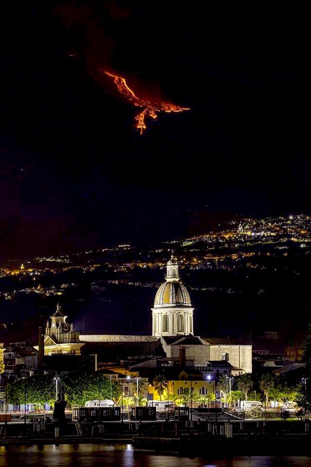 Eruption on Mount Etna (Sicily) gives the illusion of a Phoenix in the sky.