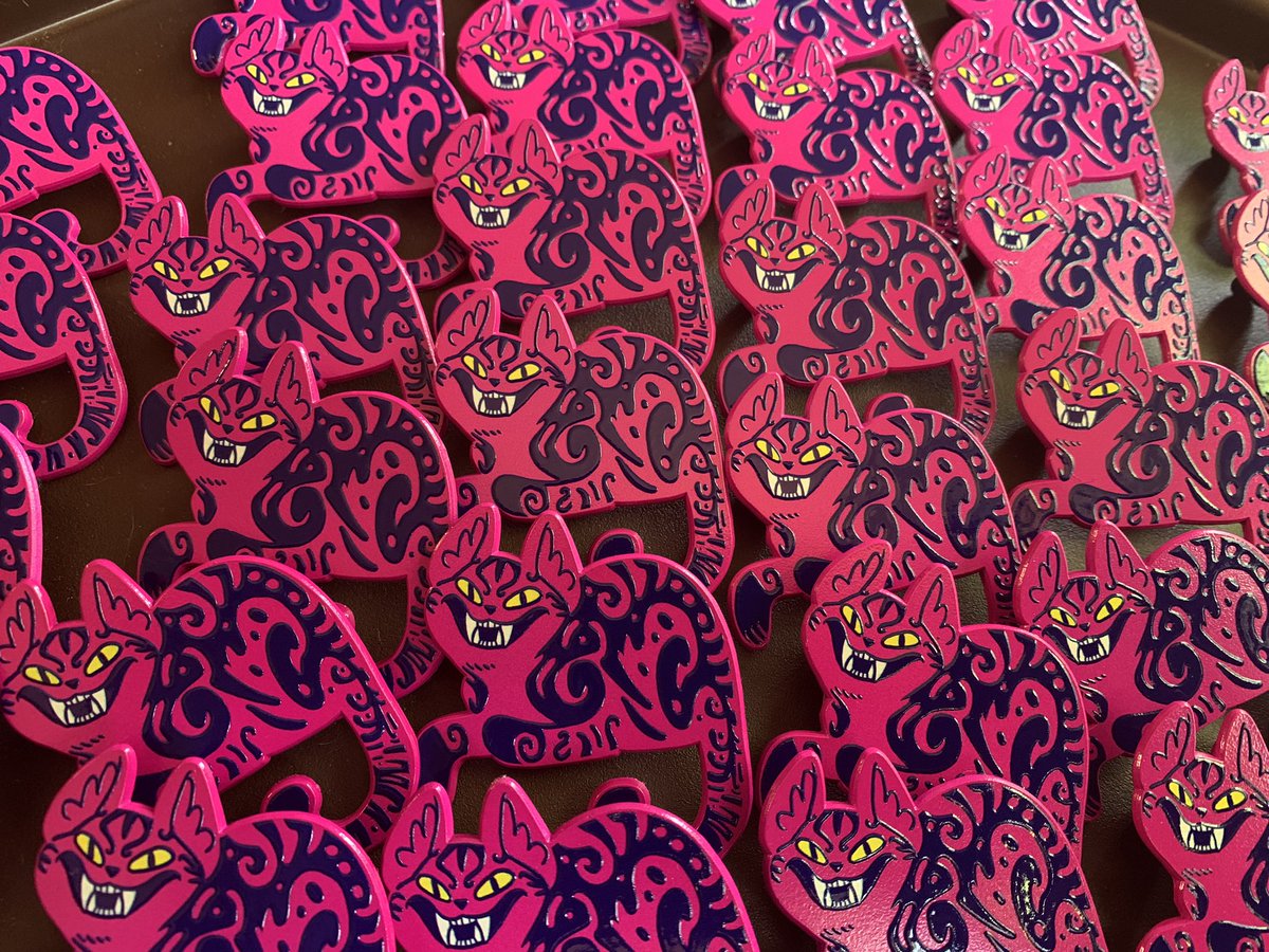 Coming soon to the store! Hot pink Cheshire cats!!