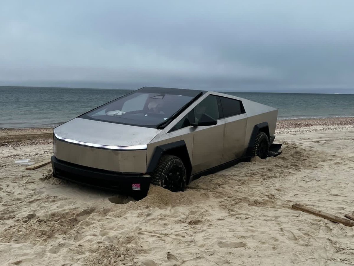 Cyber Truck driver parks in a Nantucket crosswalk… then proceeds to get stuck in the sand on the beach. Karma does exist. 😊