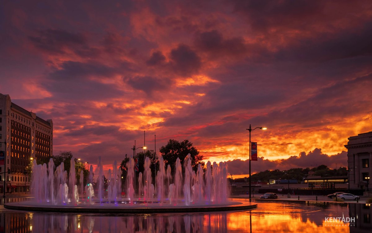 The sun sets behind Union Station and the Henry Wollman Bloch Fountain. A spectacular fall view photographed by Kent Auf Der Heide.