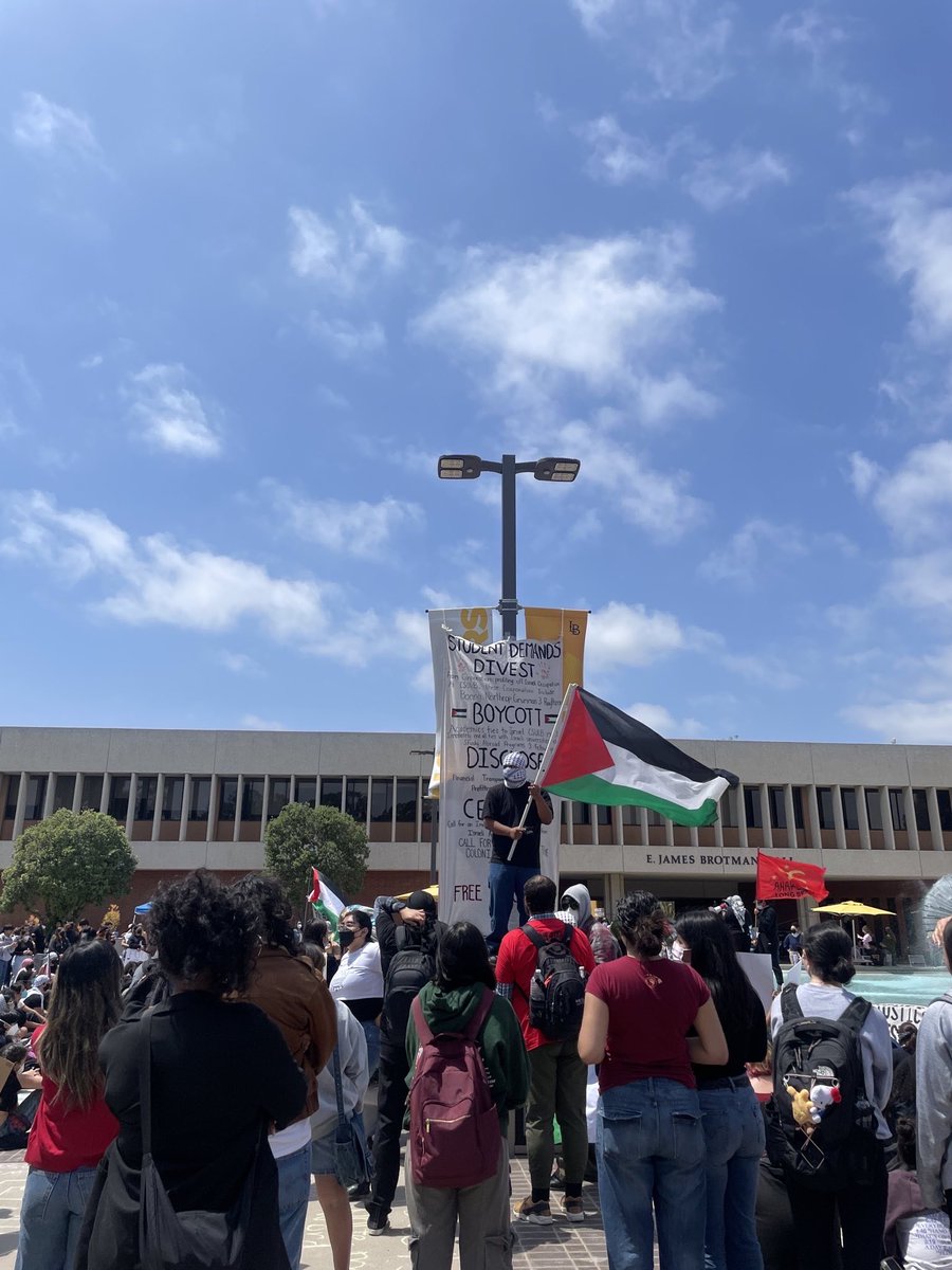 PplsCityCouncil's tweet photo. Scenes from today at Cal State Long Beach. They’ve renamed a building to be “Refaat Alareer Hall.” Team Boink was out there. 

ALL POWER TO THE STUDENTS! 
A #FreePalestine in our lifetime! https://t.co/AdNtlO5jgV