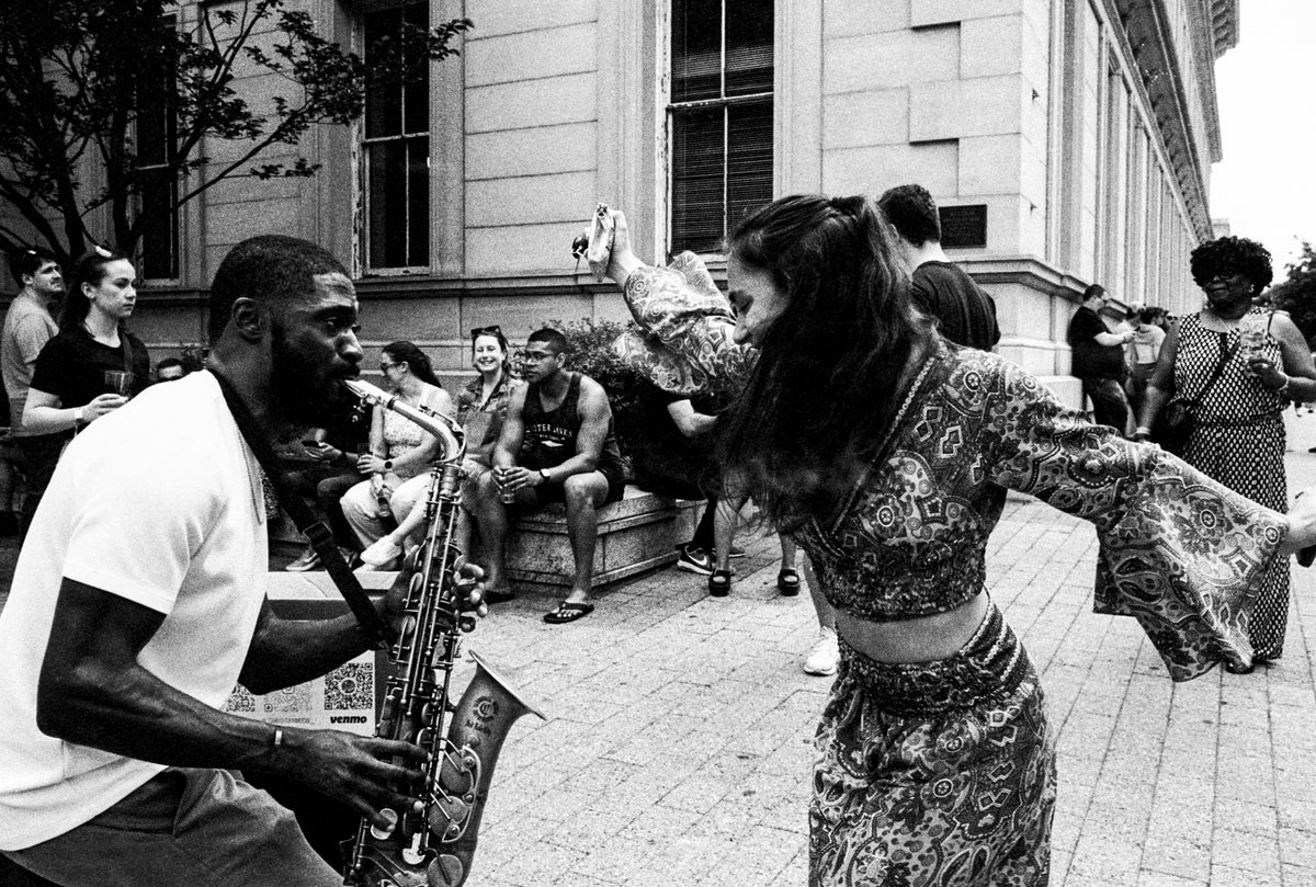 Dance to the Music Camera: Nikon F4 & 28mm Film: #ilfordphoto HP5 1600 & ID-11 Location: Raleigh, North Carolina USA #believeinfilm #photography #filmphotography #ilfordHP5 #streetphotography