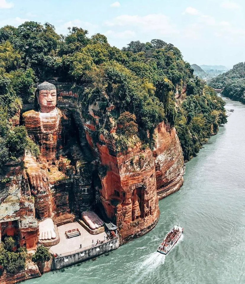 This is the Leshan Giant Buddha in China, carved into the cliffs to watch over the treacherous river below.

It is 1,221 years old and an incredible 71 metres tall.

Impressive — but it's only the 9th biggest Buddha statue in the world...