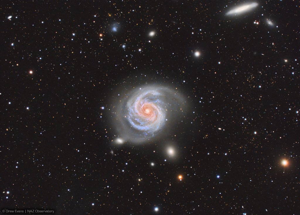 Majestic on a truly cosmic scale, M100 is appropriately known as a grand design spiral galaxy. The large galaxy of over 100 billion stars has well-defined spiral arms, similar to our own Milky Way. One of the brightest members of the Virgo Cluster of galaxies, M100, also known as