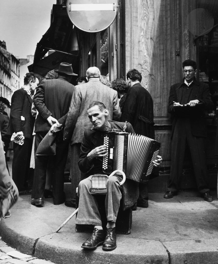 'Accordionist from rue Mouffetard Paris'
Robert Doisneau 1951