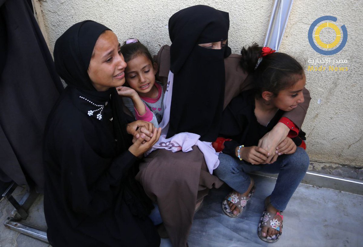 Citizens bid farewell to the martyrs of the Israeli bombing on the Bureij camp in the central Gaza Strip