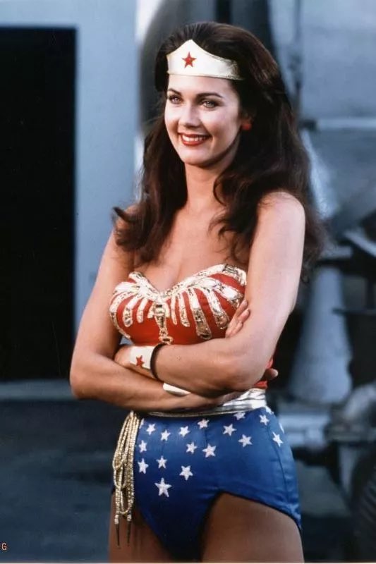 Wonder Woman smiles when informed of her poll win.