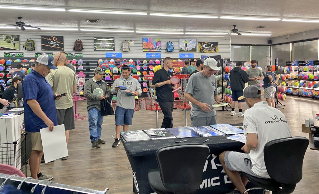 Earlier today, fans mingled with two-time disc golf World Champion @sockibomb13 during a signing session at our Pro Shop. #dynamicdiscsopen 6/6