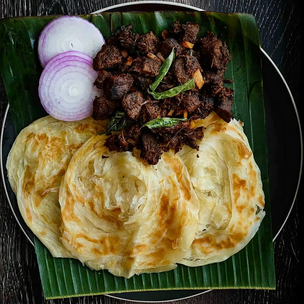 There's absolutely nothing to be 'proud' of what you eat. None of us become pure souls by eating only vegetarian food. Life is short.. Keep calm and go try a plate of Mouth watering Kerala Parotta and Beef Roast 😋 Trust me, you won't regret.