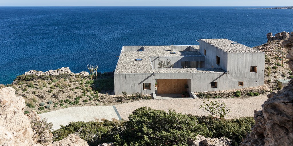 The sparse, untamed and dramatic #landscape was the starting point for this #design in Karpathos, #Greece. Every manmade alteration would be visible in the unique lot with its jagged, textured cliffs. architonic.com/20278730