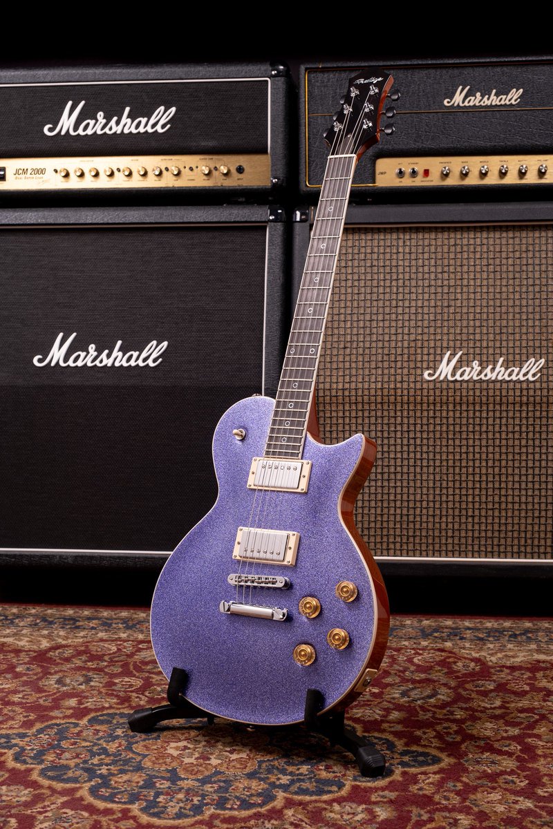 This Guitar Looks like a PURPLE SWEETTART