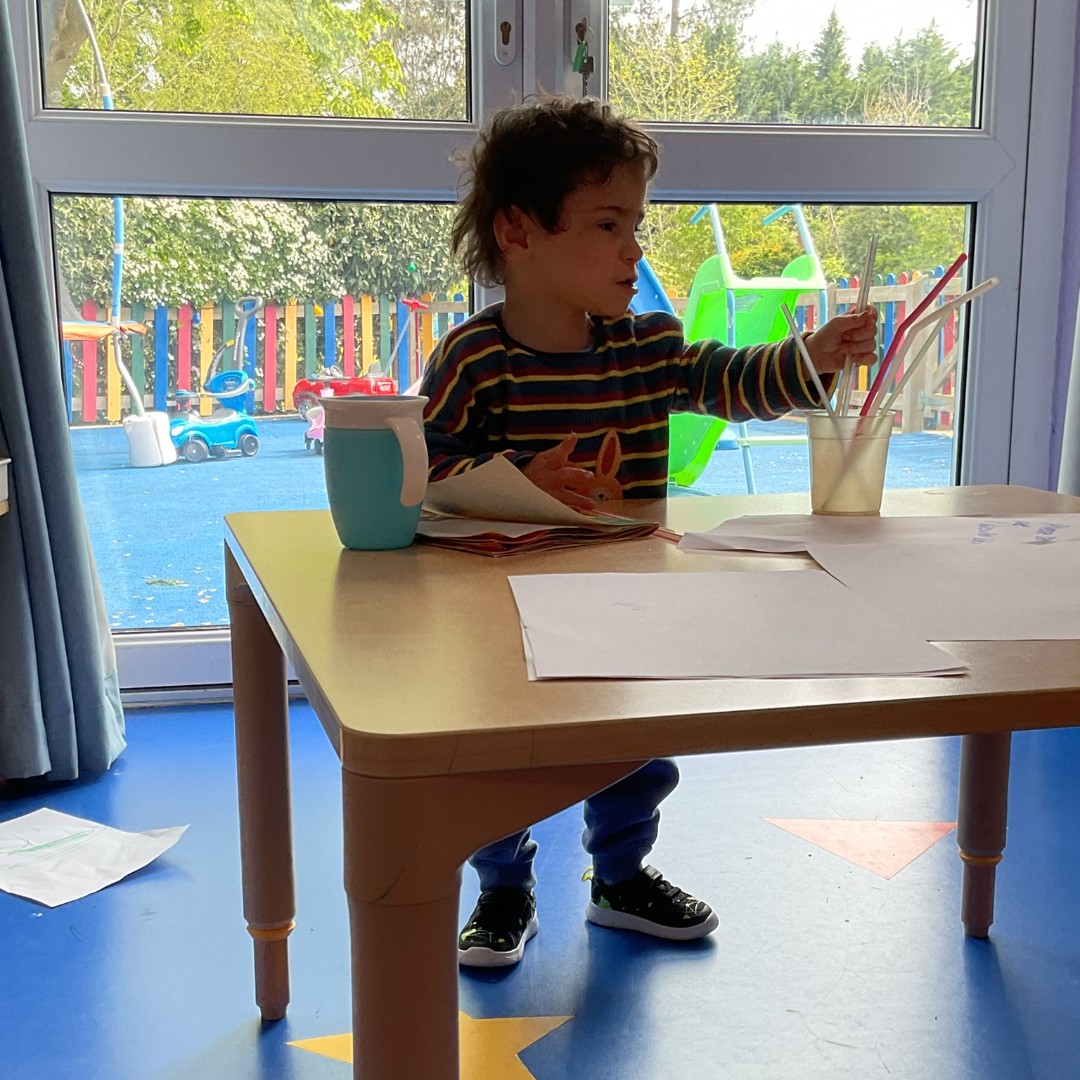 Milo spent some time collecting up the straws to fill the cup. He did this whilst sitting as well as standing  at the table. Great standing skills Milo! #MakingMagicMemories #JHT #JamesHopkinsTrust #KitesCorner #NursingRespiteCare #Gloucestershire #Charity #ChildrensHospice